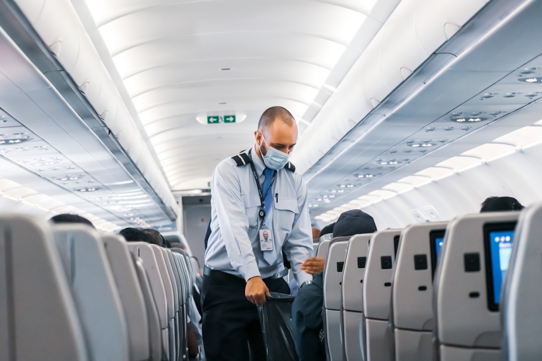 Air Traffic Controller Retirement Requirements: Mandatory retirement age information - image: man cleaning plane